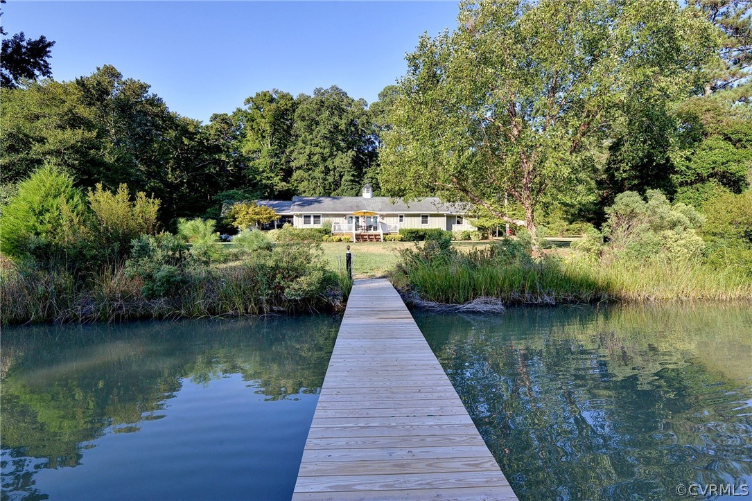 1020 Pine Hall Road Mathews, VA 23109 - Photo 25 of 49 a view of a lake with a large trees
