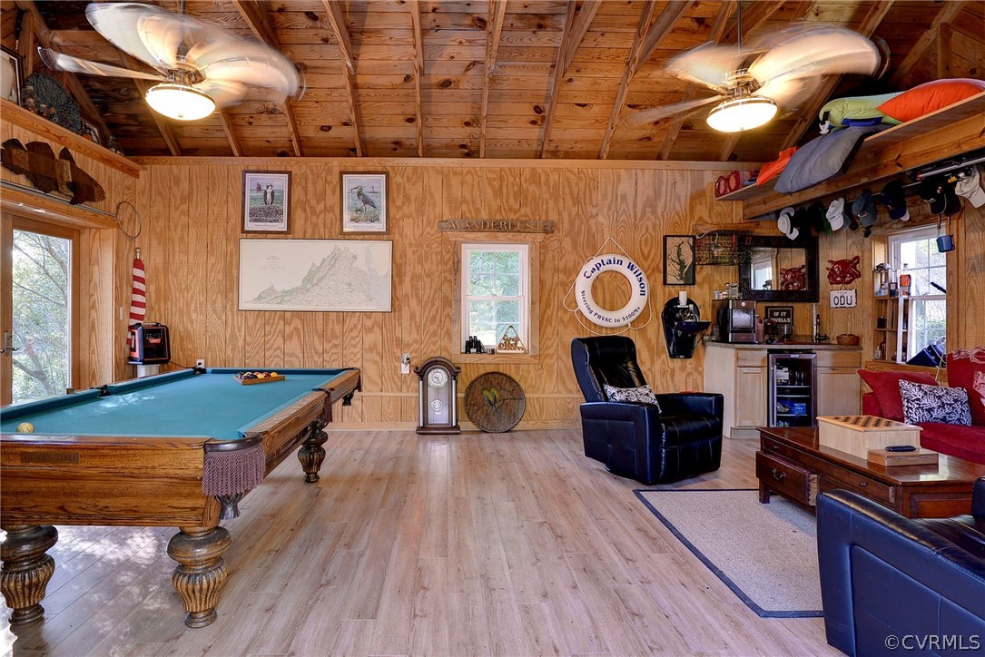 1020 Pine Hall Road Mathews, VA 23109 - Photo 40 of 49 a living room with furniture and wooden floor