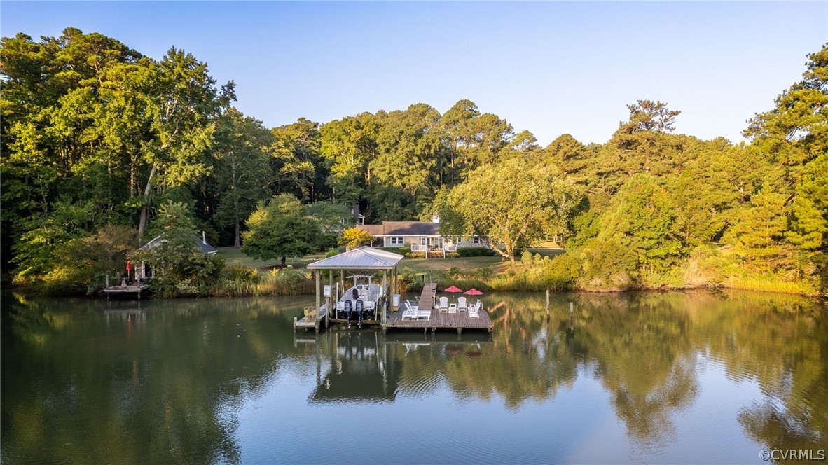 1020 Pine Hall Road Mathews, VA 23109 - Photo 44 of 49 a view of a lake with houses