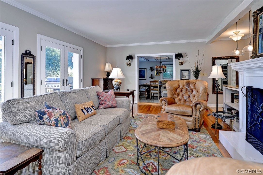 1020 Pine Hall Road Mathews, VA 23109 - Photo 8 of 49 a living room with furniture and a wooden floor
