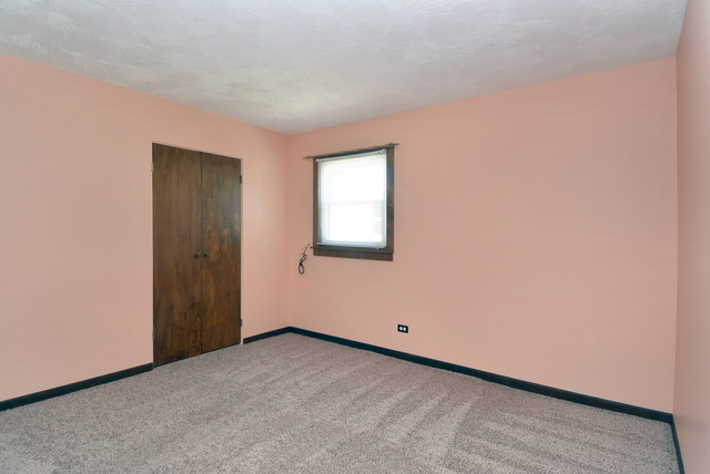 370 Dunbar Road Wauconda, IL 60084 - Photo 11 of 22 a view of an empty room and window