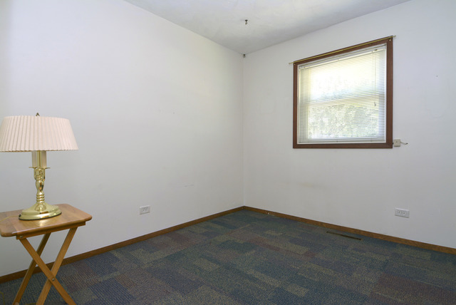 370 Dunbar Road Wauconda, IL 60084 - Photo 14 of 22 a room with a window and a table