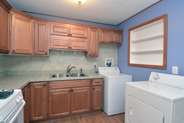 370 Dunbar Road Wauconda, IL 60084 - Photo 6 of 22 a kitchen with sink cabinets and window