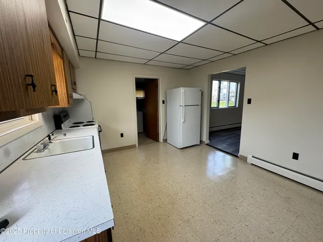 a view of a storage & utility room with washer and dryer
