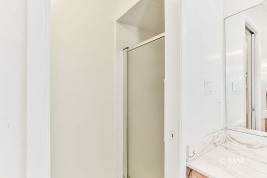 231 South Locust Street Ridgecrest, CA 93555 - Photo 27 of 35 a bathroom with a sink and a mirror