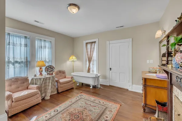 a living room with furniture and a window