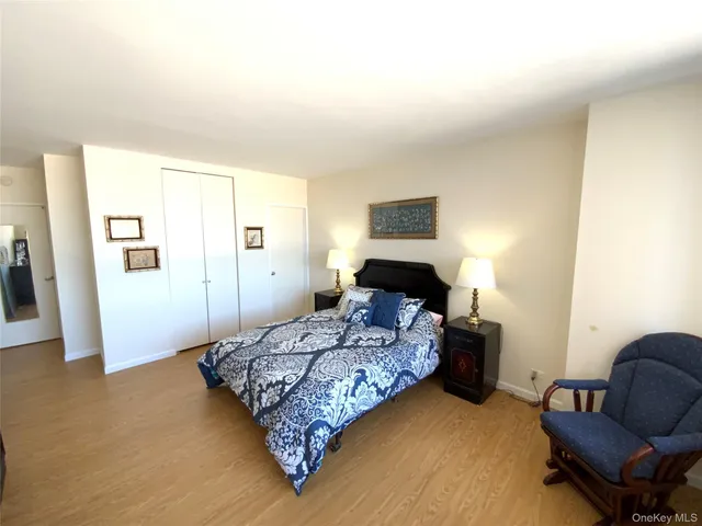 a bedroom with a bed and furniture