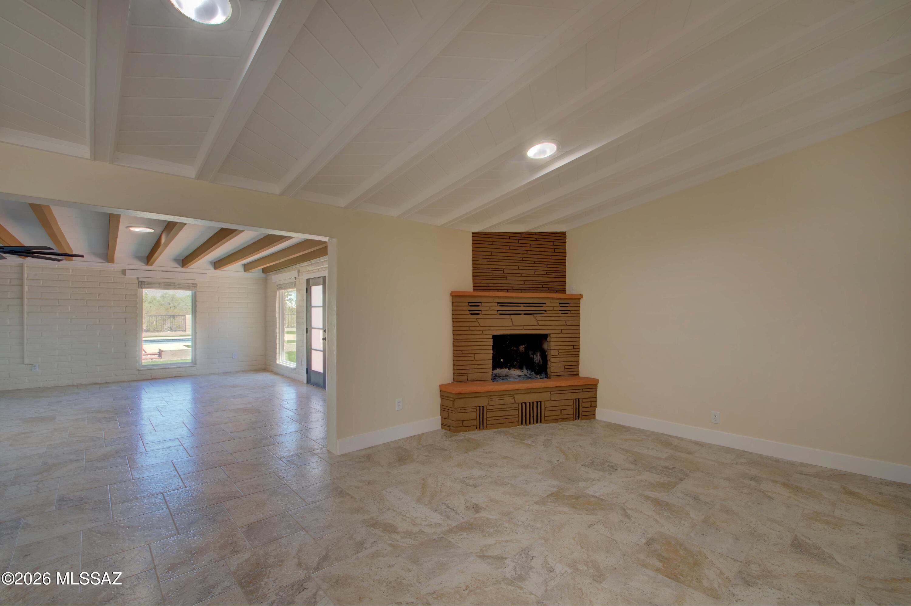 Flexible space, perfect for a dining area, den or living space.