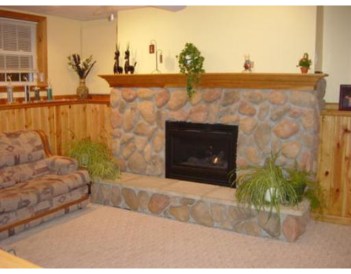57 Bucklin Road North Andover, MA 01845 - Photo 5 of 12 a living room with furniture and a fireplace