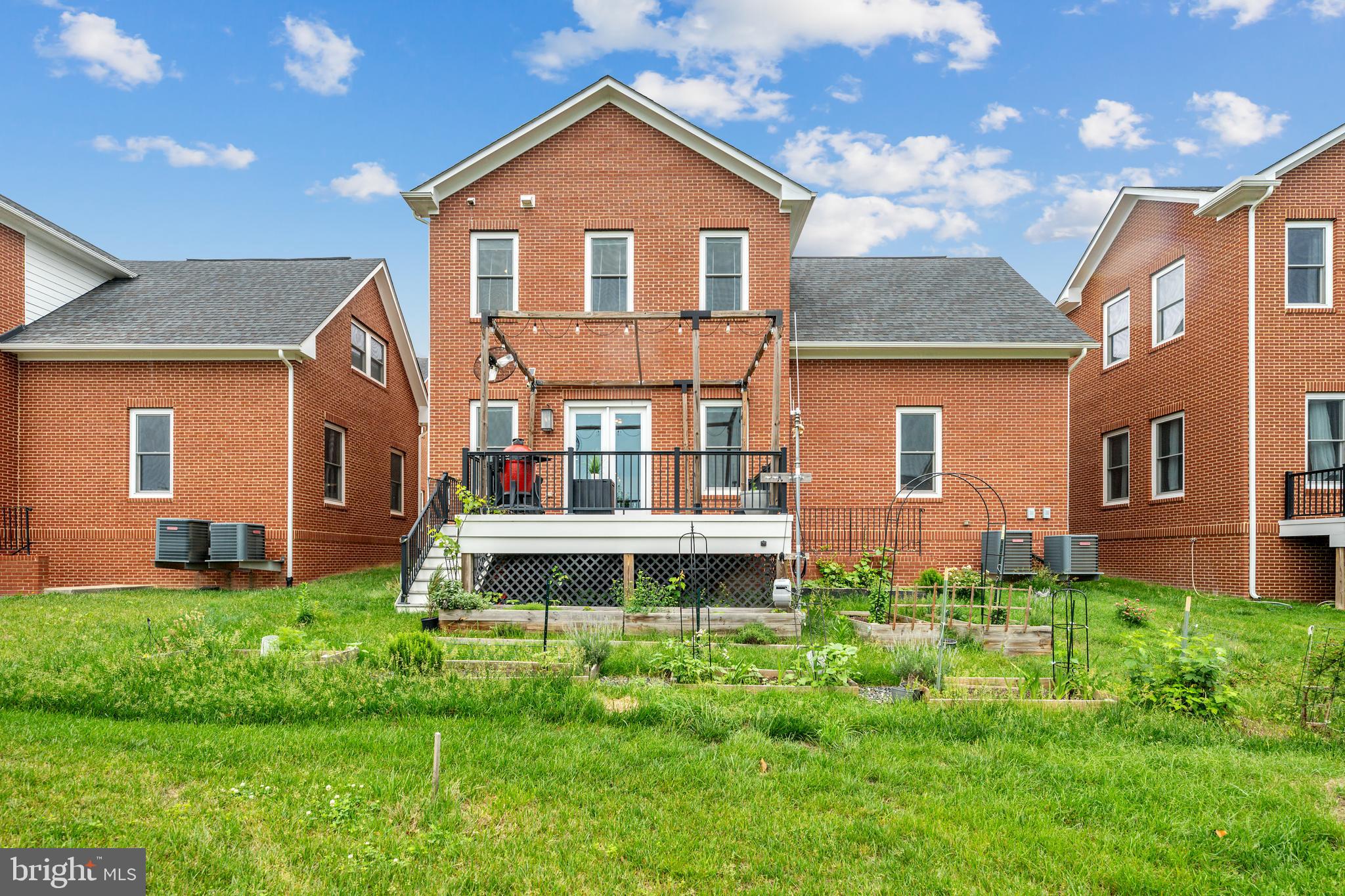 8459 Reformatory Way Lorton, VA 22079 - Photo 54 of 78 a front view of a house with a yard