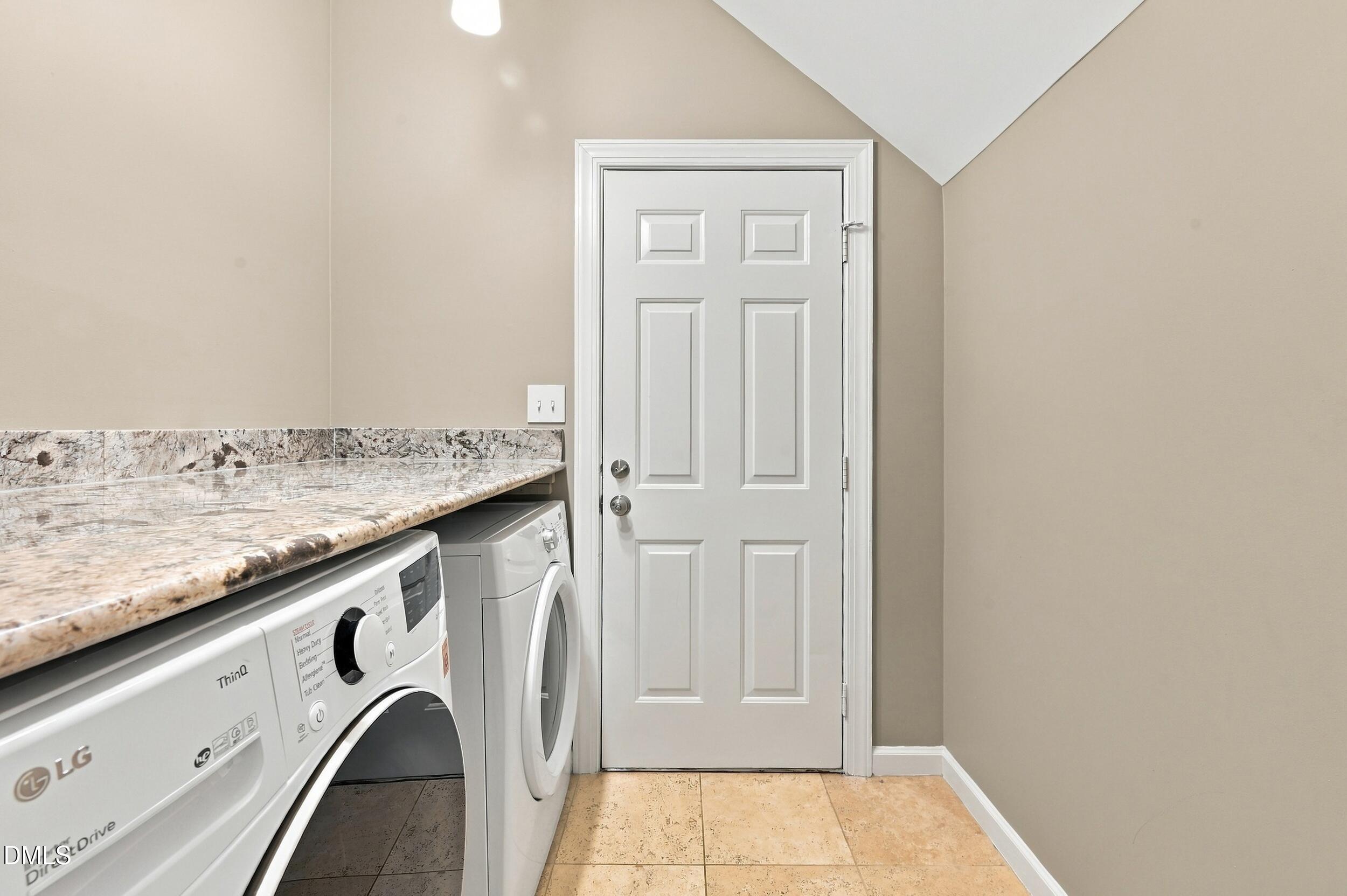 8505 Bluff Pointe Court Raleigh, NC 27615 - Photo 6 of 39 laundry room entry from garage