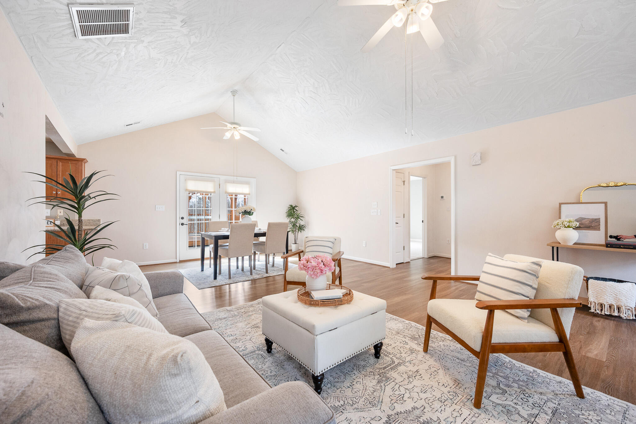1247 Navigation Goodview, VA 24095 - Photo 14 of 54 a living room with furniture and a chandelier