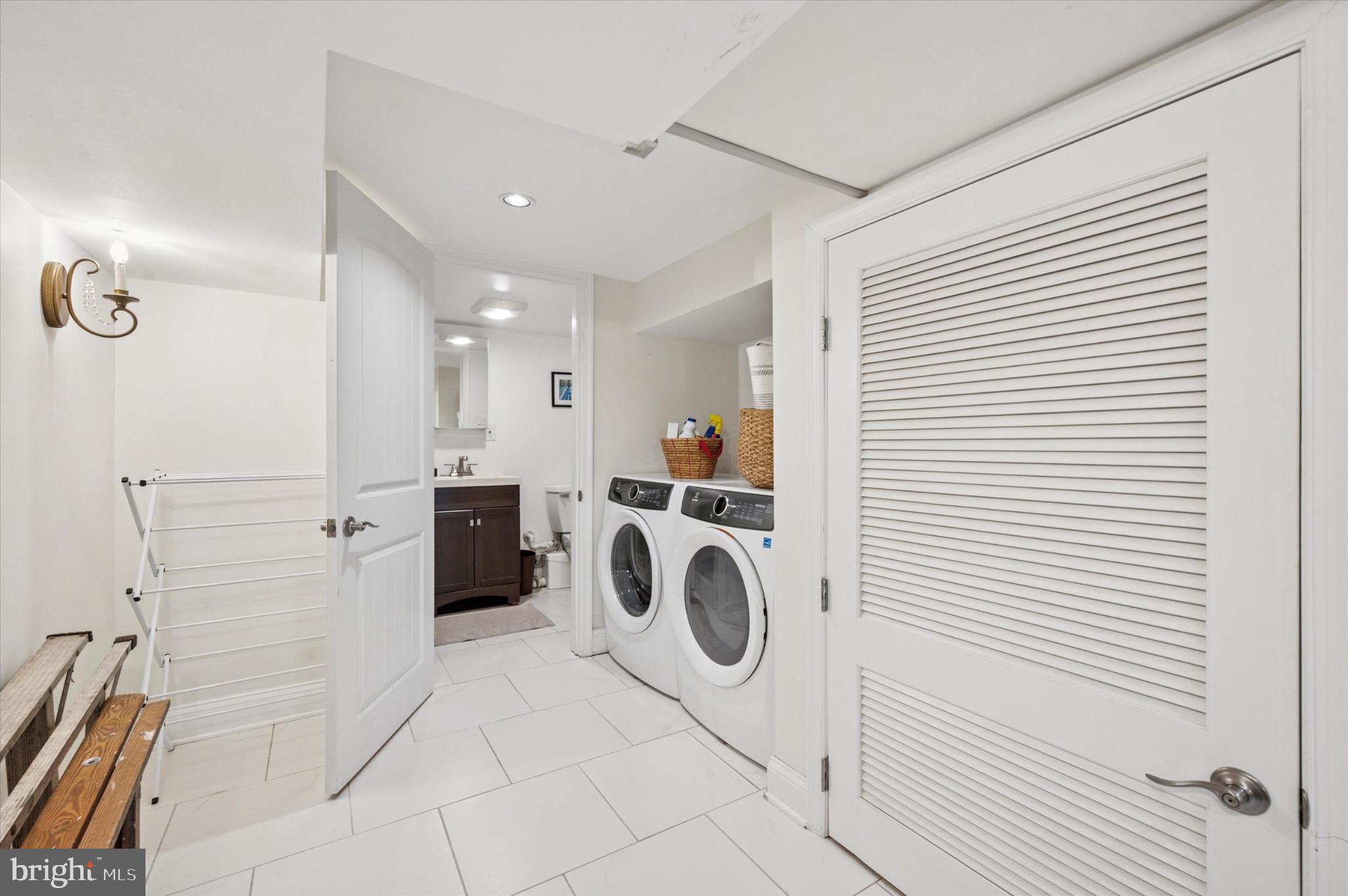 1131 Divinity Street Philadelphia, PA 19143 - Photo 33 of 38 Laundry in finished basement.