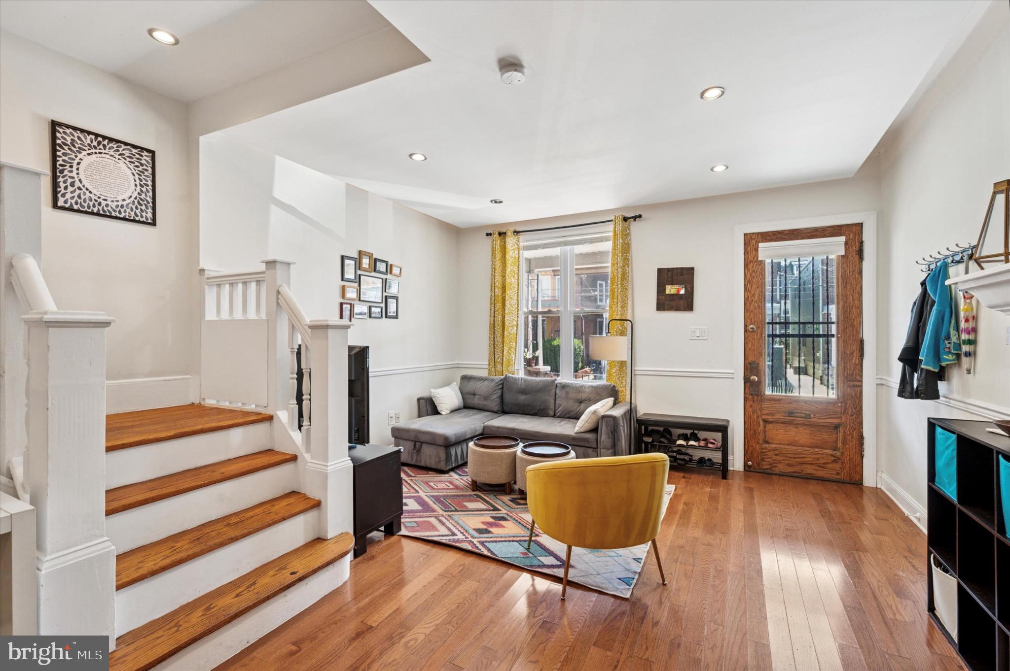 1131 Divinity Street Philadelphia, PA 19143 - Photo 5 of 38 Inviting living space with warm wooden accents.