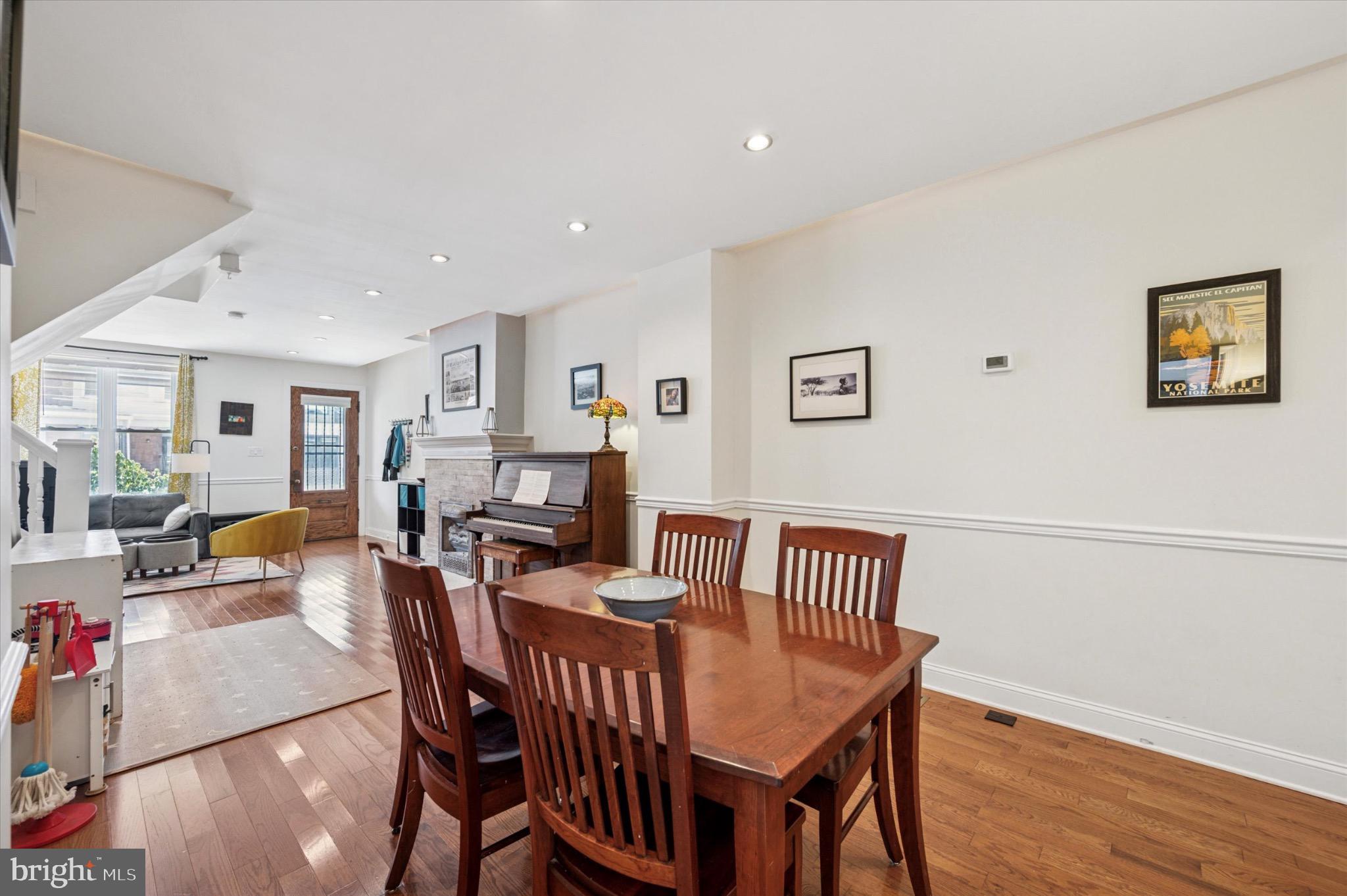 1131 Divinity Street Philadelphia, PA 19143 - Photo 10 of 38 Inviting open space with warm wooden tones.