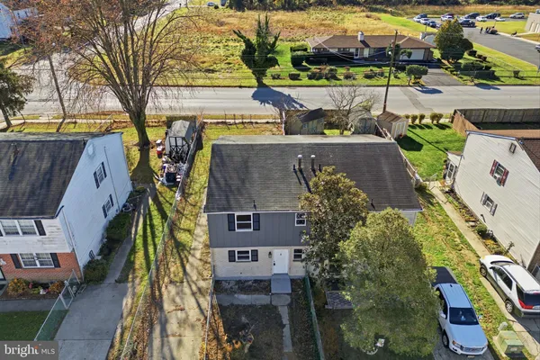 an aerial view of a house with a garden