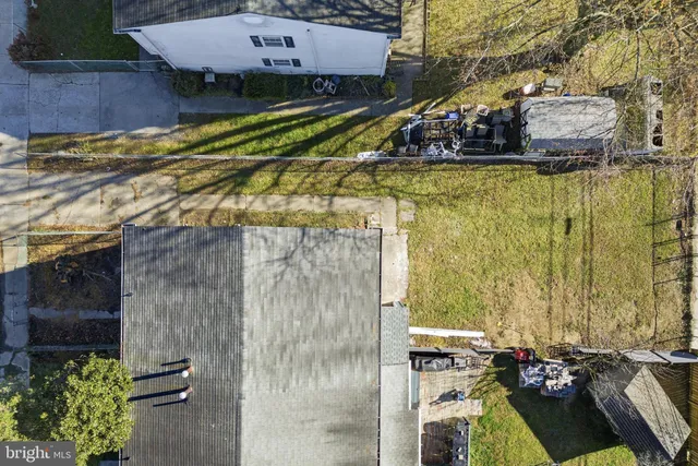 a aerial view of a house with a yard