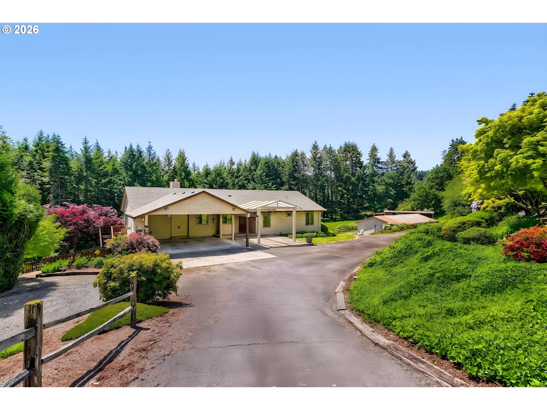 45354 Northwest Hartwick Road Banks, OR 97106 - Photo 34 of 35 a front view of a house with a yard and potted plants