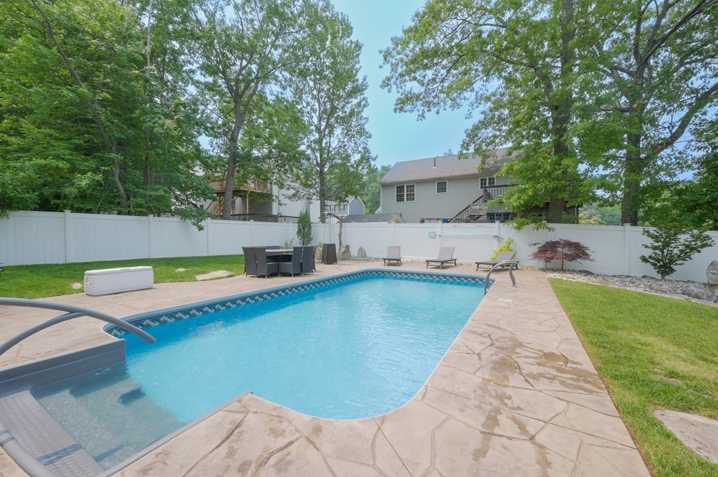 a view of outdoor space yard swimming pool and patio