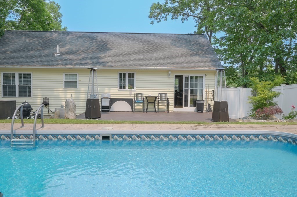 408 Sunderland Road Worcester, MA 01604 - Photo 15 of 24 a house view with swimming pool and furniture