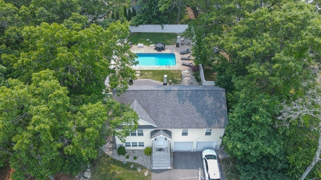 408 Sunderland Road Worcester, MA 01604 - Photo 22 of 24 an aerial view of a house with outdoor space and trees all around