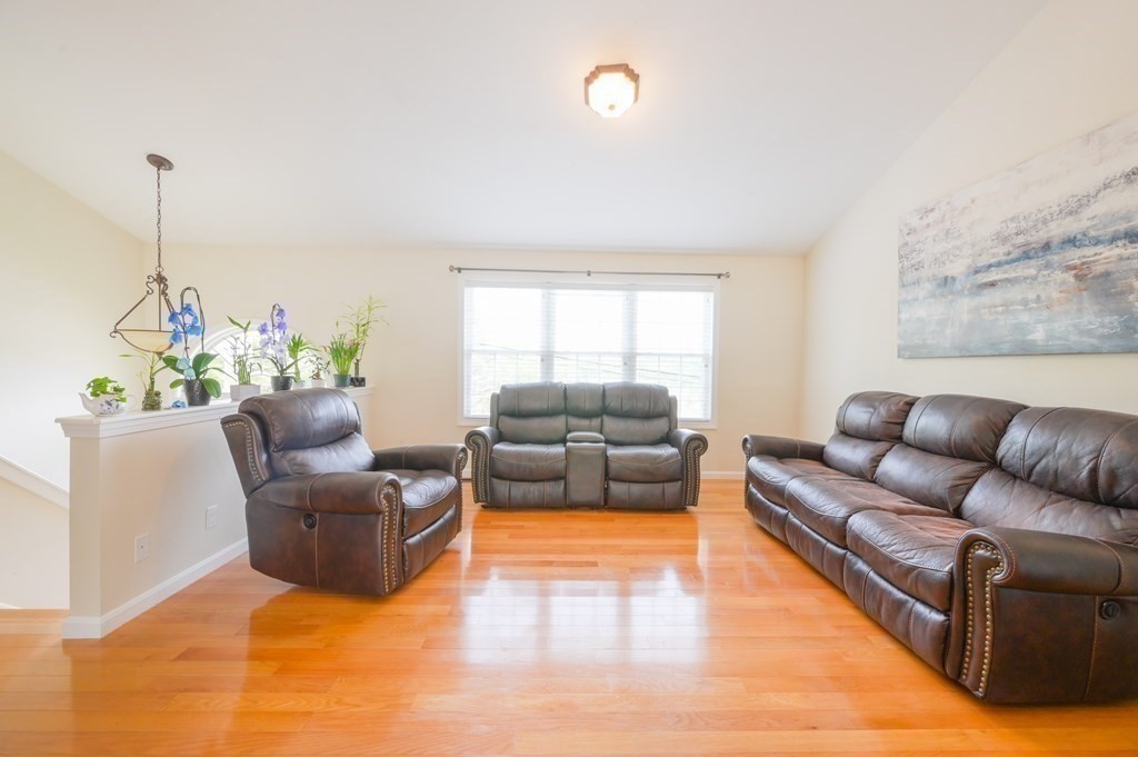 408 Sunderland Road Worcester, MA 01604 - Photo 6 of 24 a living room with furniture and a large window