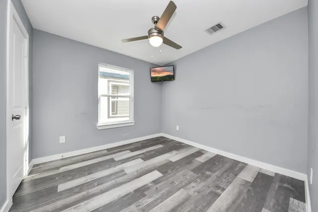 a view of entryway and hall with a window