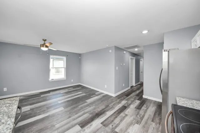 a view of a livingroom with a staircase