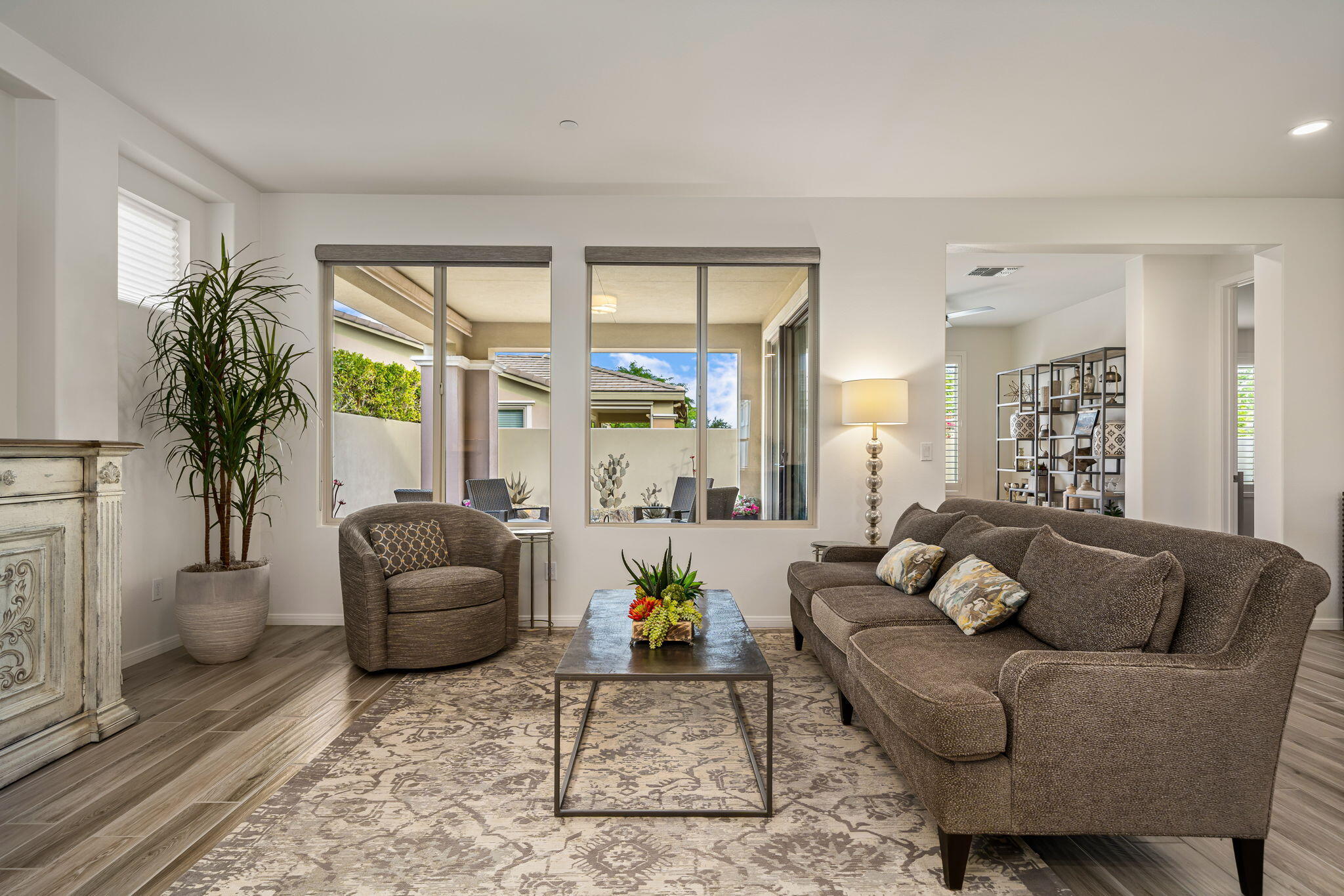 51270 North Two Palms Way Indio, CA 92201 - Photo 12 of 43 a living room with furniture and a large window