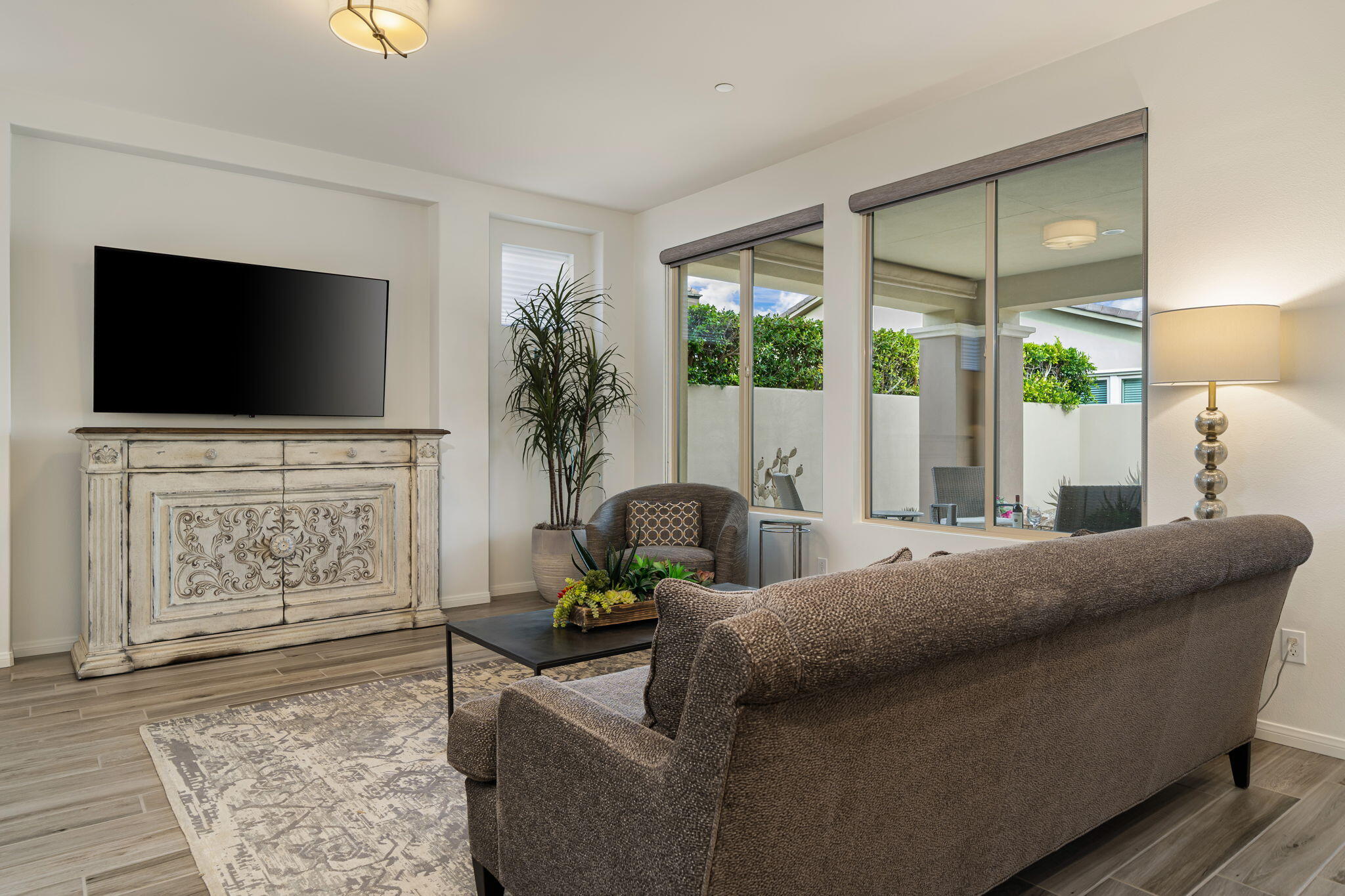51270 North Two Palms Way Indio, CA 92201 - Photo 13 of 43 a living room with furniture and a flat screen tv