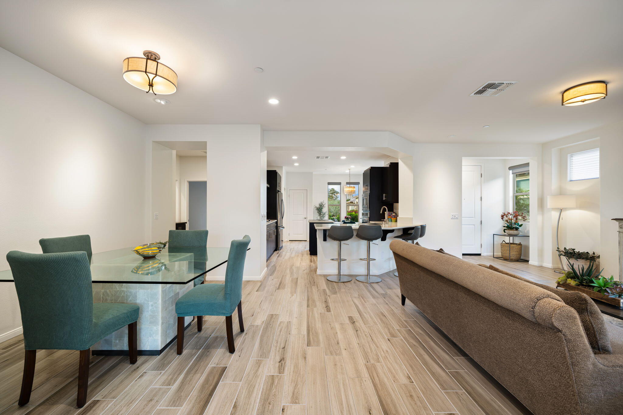 51270 North Two Palms Way Indio, CA 92201 - Photo 19 of 43 a living room with furniture and a wooden floor