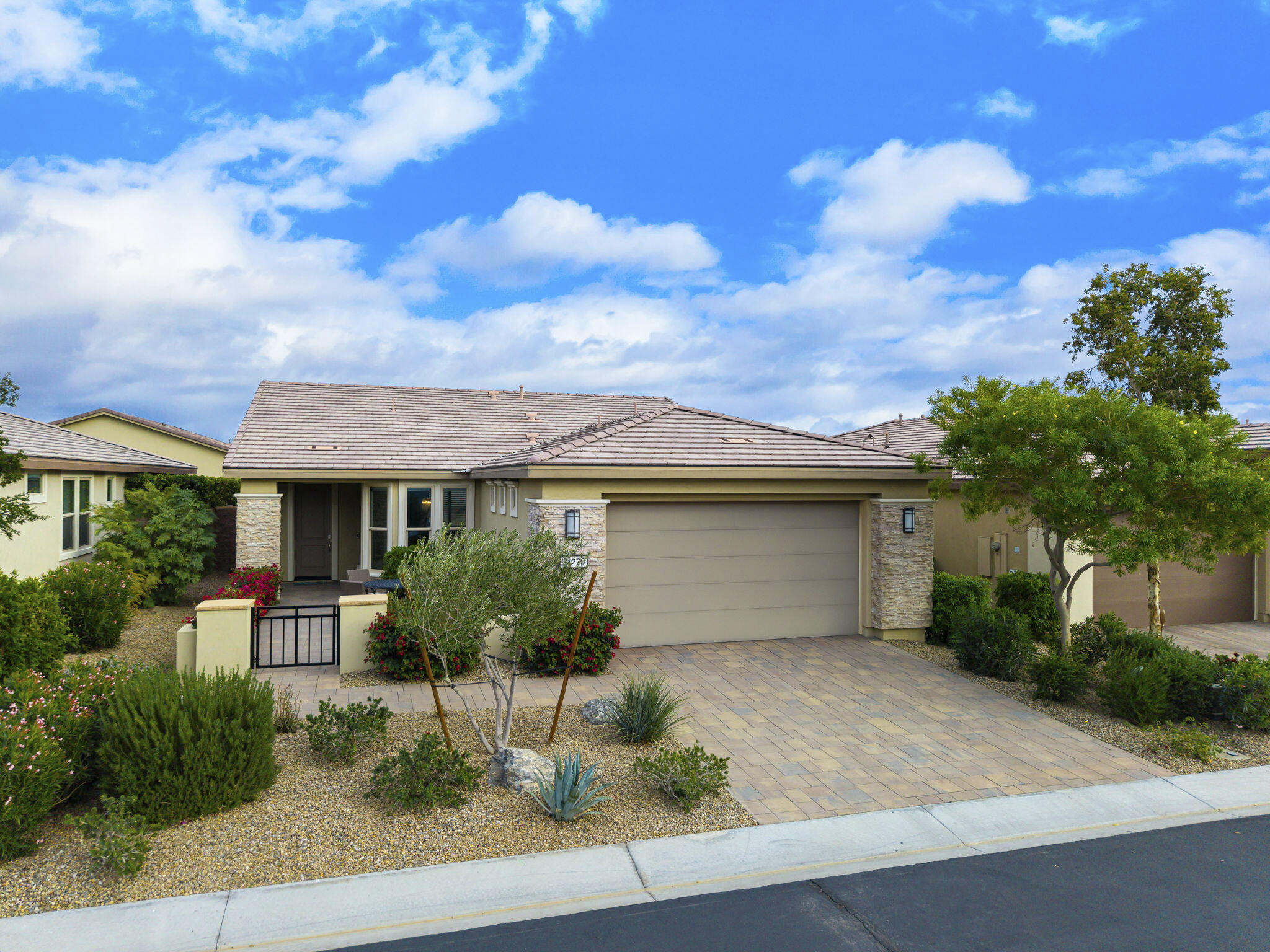 51270 North Two Palms Way Indio, CA 92201 - Photo 2 of 43 front view of house with a yard