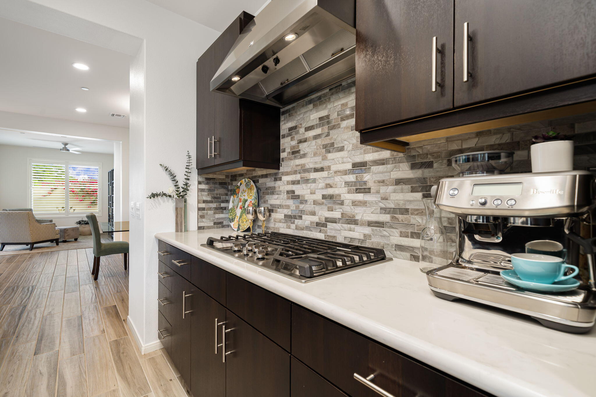 51270 North Two Palms Way Indio, CA 92201 - Photo 25 of 43 a kitchen with a stove and cabinets