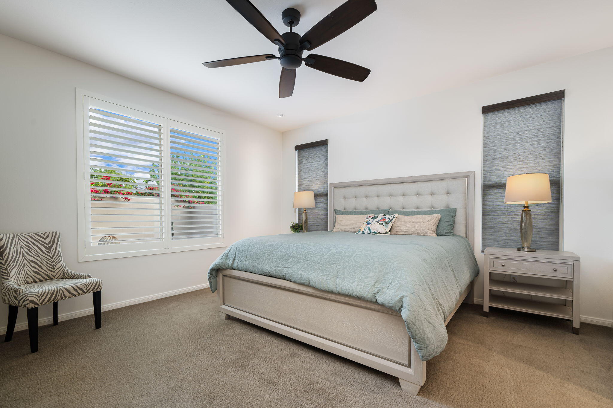 51270 North Two Palms Way Indio, CA 92201 - Photo 27 of 43 a bedroom with a bed and a window
