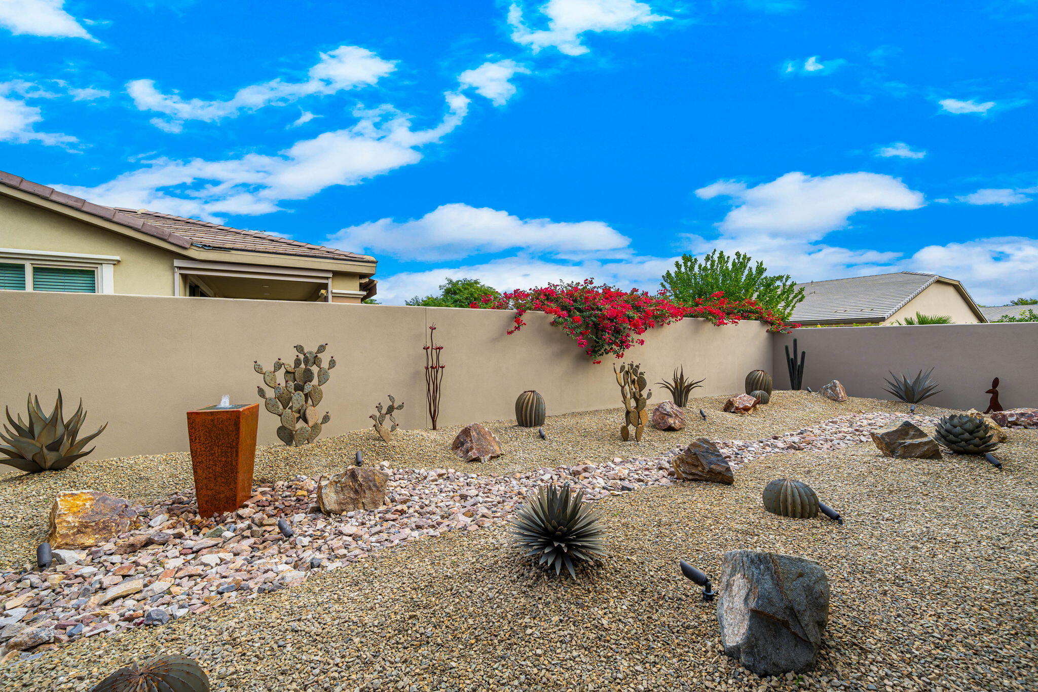 51270 North Two Palms Way Indio, CA 92201 - Photo 39 of 43 a view of a backyard with table and chairs