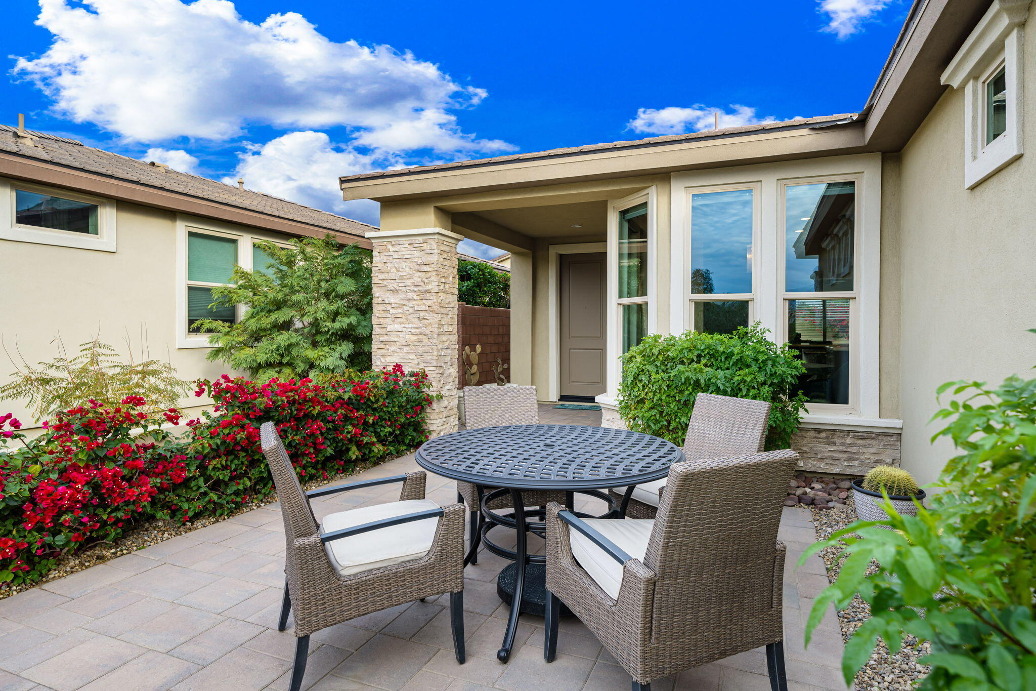 51270 North Two Palms Way Indio, CA 92201 - Photo 8 of 43 a view of a house with a yard and sitting area