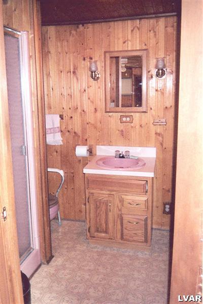 0 Hc Gilbert, PA 18331 - Photo 17 of 17 a bathroom with a sink and a mirror