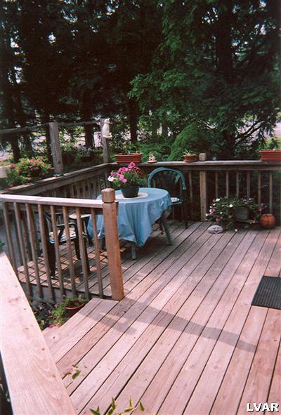 0 Hc Gilbert, PA 18331 - Photo 4 of 17 a view of deck with wooden floor and seating space