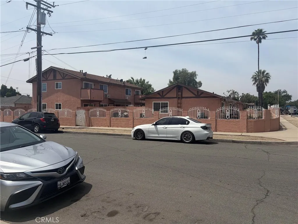 308 North Millard Avenue Rialto, CA 92376 - Photo 1 of 11 a view of a cars park in front of a house