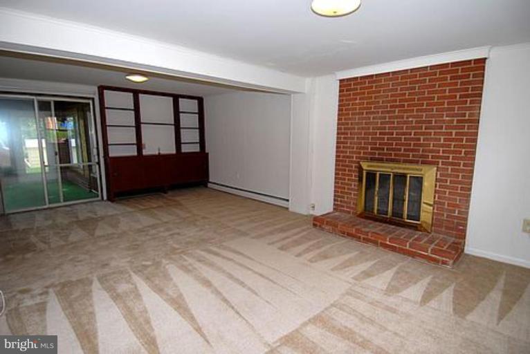 14107 Grayson Road Woodbridge, VA 22191 - Photo 6 of 17 Family Room and Sunroom