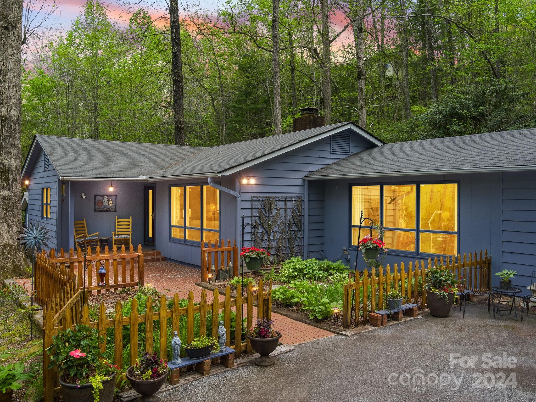 159 Jervey Road Tryon, NC 28782 - Photo 1 of 43 a backyard of a house with yard and outdoor seating