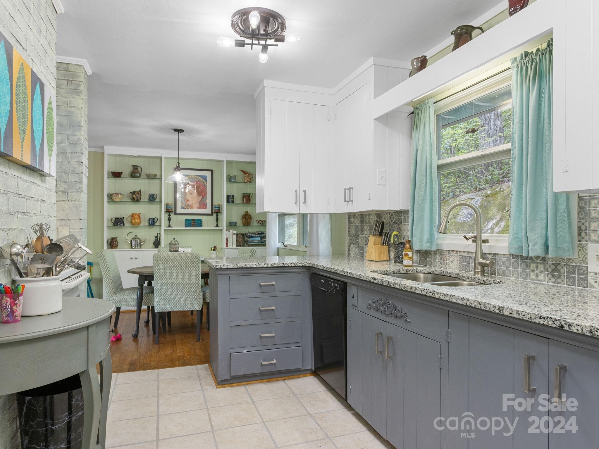 159 Jervey Road Tryon, NC 28782 - Photo 12 of 43 a kitchen with a sink cabinets and window
