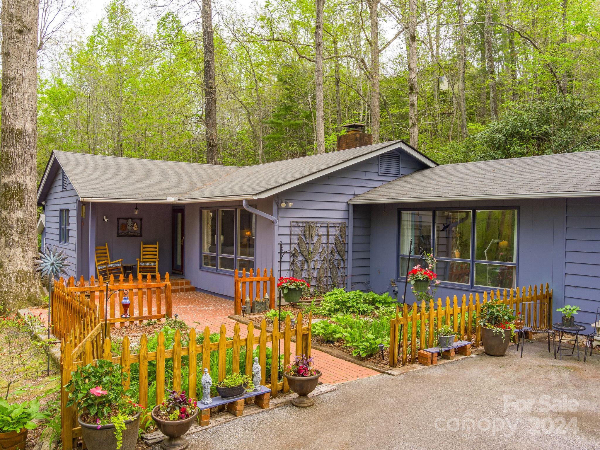 159 Jervey Road Tryon, NC 28782 - Photo 2 of 43 front view of a house with a patio