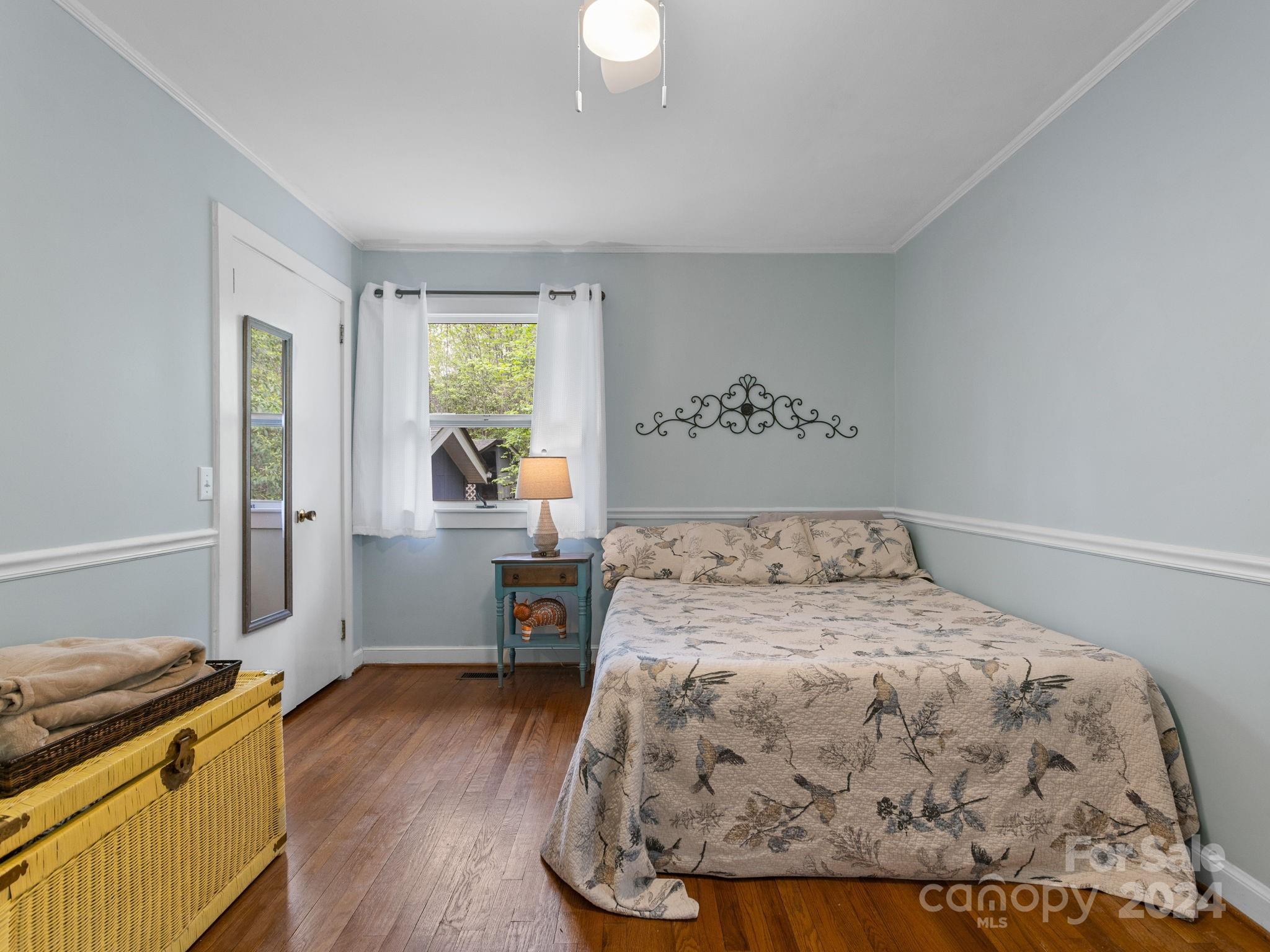 159 Jervey Road Tryon, NC 28782 - Photo 21 of 43 a bed sitting in a bedroom next to a window