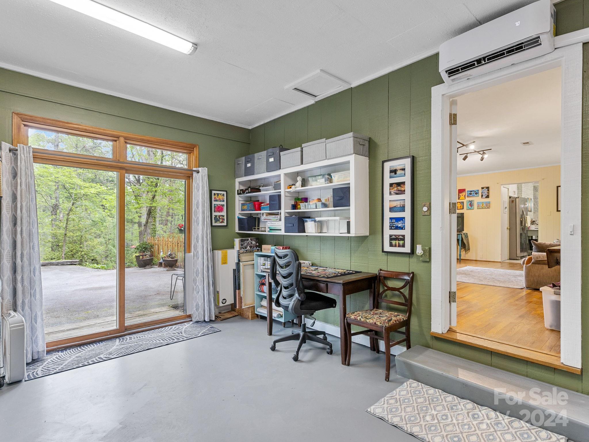 159 Jervey Road Tryon, NC 28782 - Photo 27 of 43 a workspace with furniture and a window