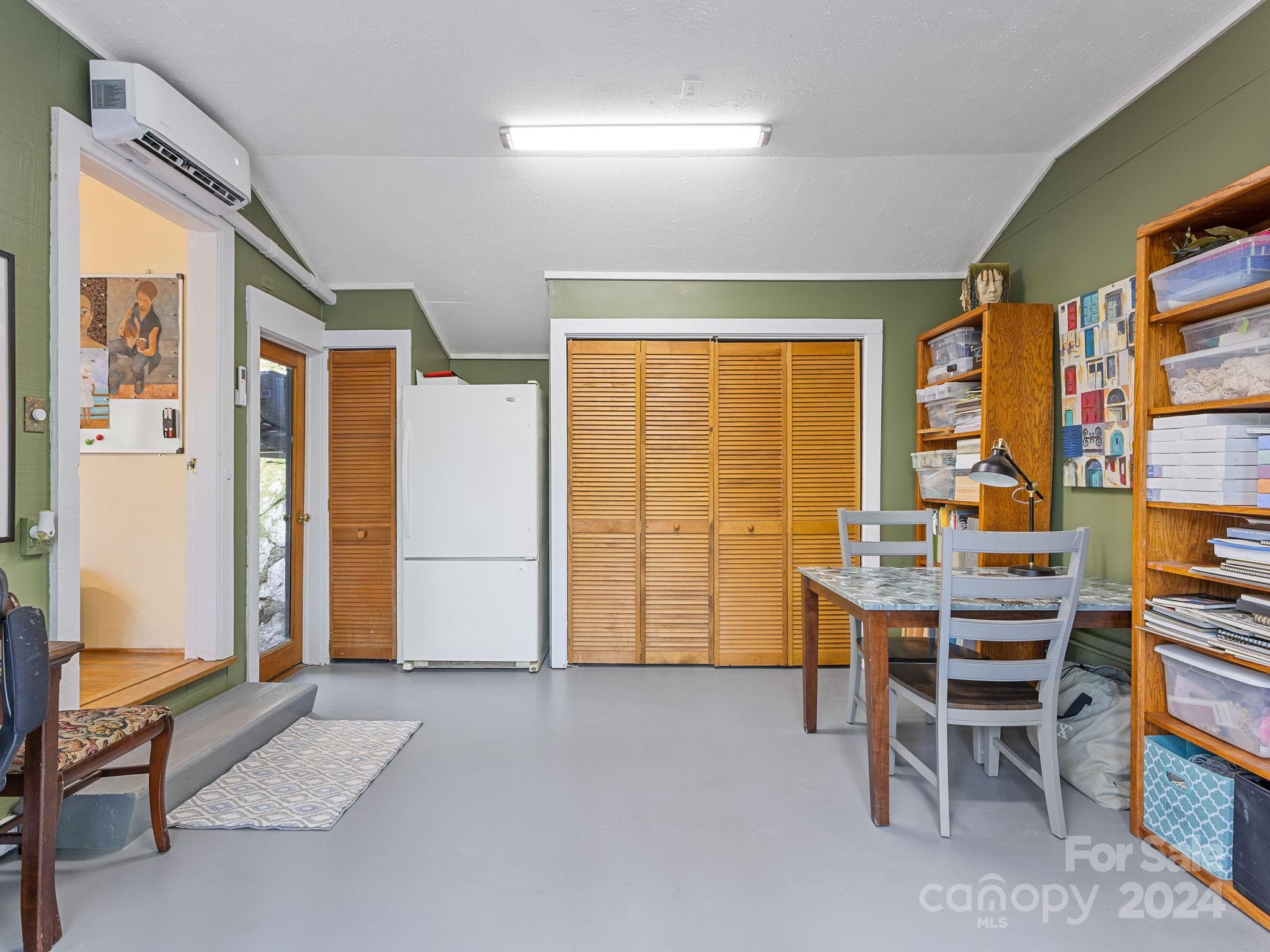 159 Jervey Road Tryon, NC 28782 - Photo 29 of 43 a view of a workspace with furniture and a window