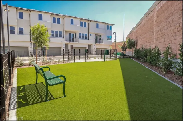 a view of swimming pool with outdoor seating
