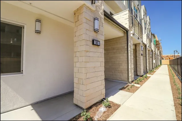 a view of a door and wooden floor