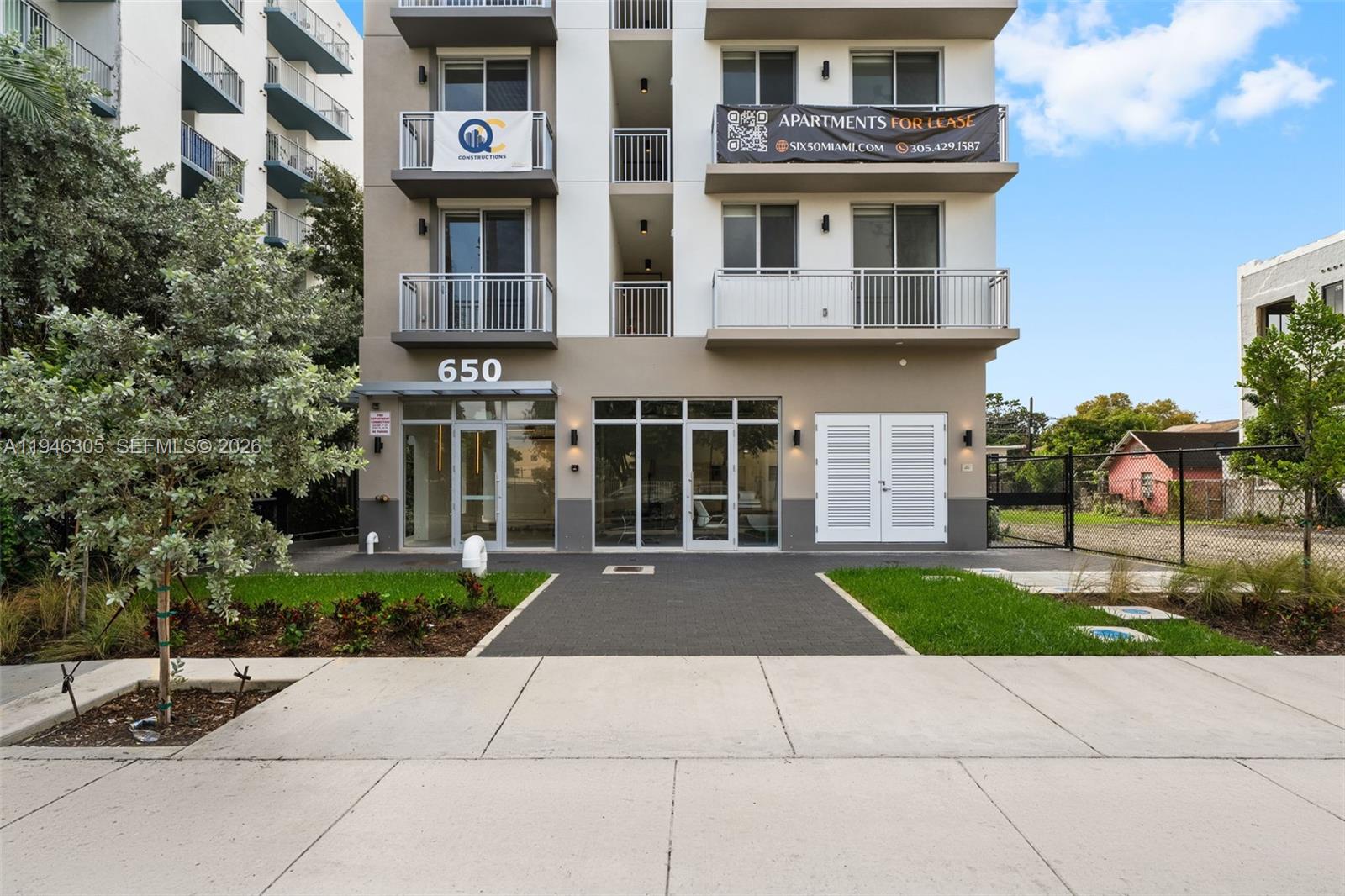 650 Southwest 1st Street, Unit 406 Miami, FL 33130 - Photo 22 of 33 a view of a building with a yard