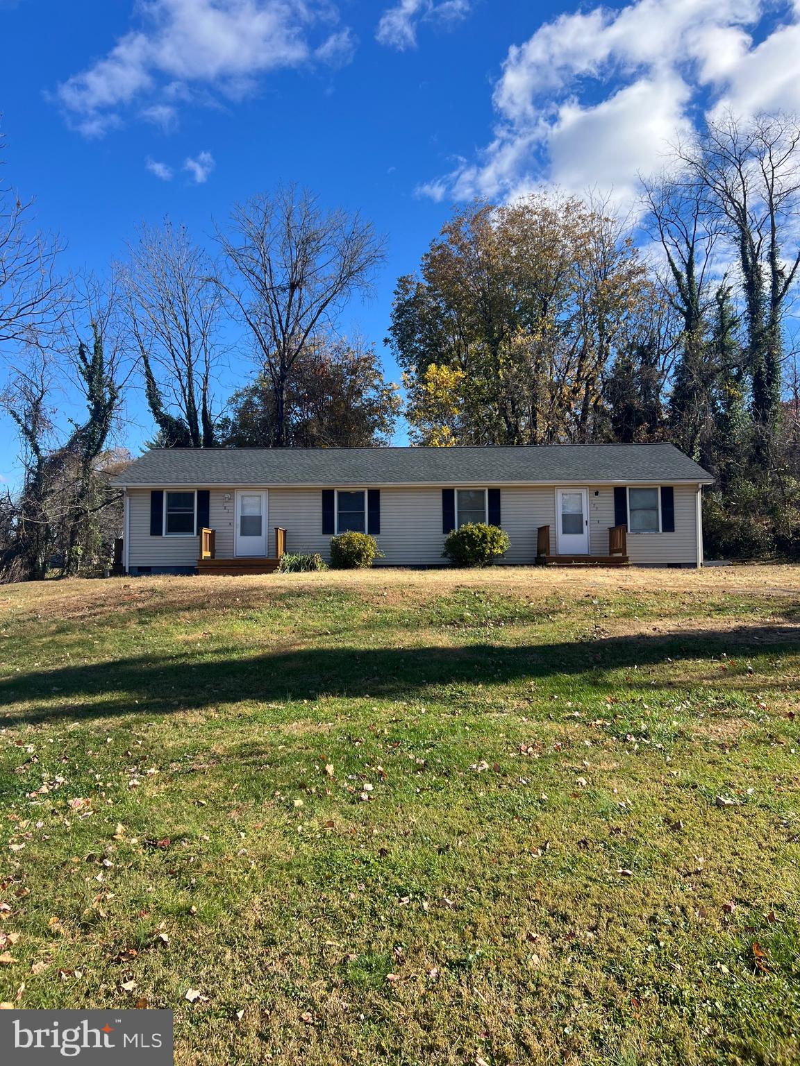 183 North Almond Street, Unit 183 Orange, VA 22960 - Photo 1 of 10 a front view of a house with garden